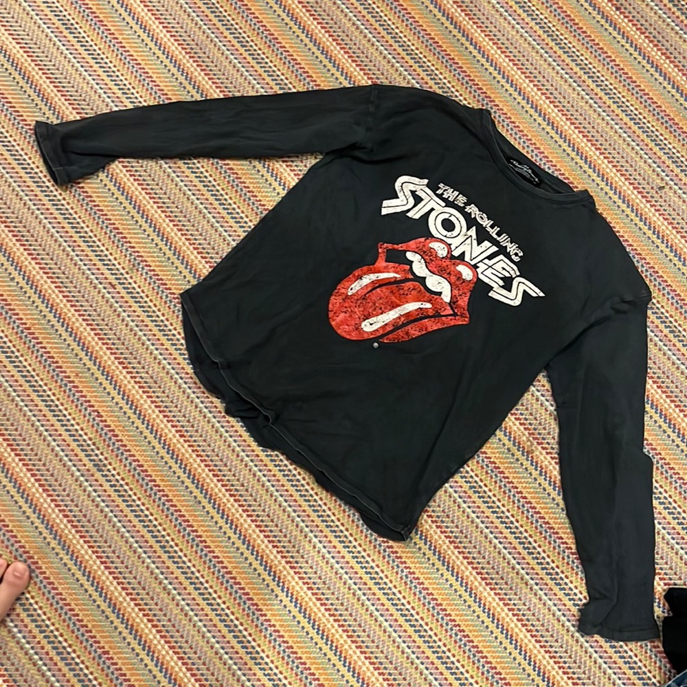 This is a Rolling Stones T-shirt I’d say it off in ages 10 or nine through 14